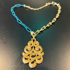 Trifari rare pendant paired with a modern chain. Unique!
